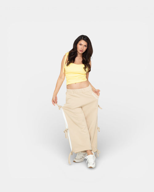Pransh signature sweatpants in Beige, 100% French terry premium cotton, wide-leg fit with side bow straps
