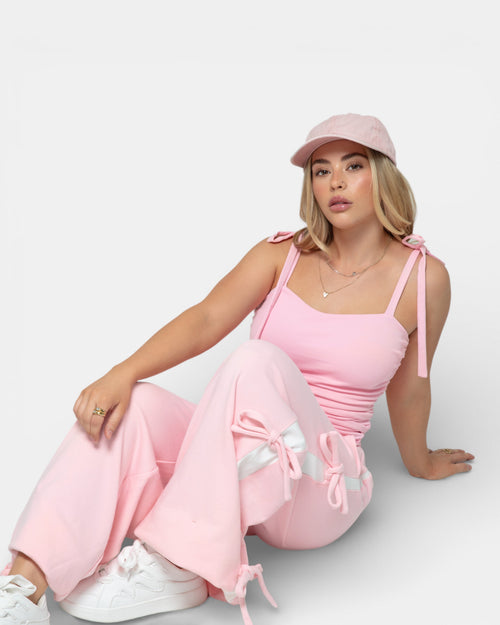 Pransh Muse Cinch Top in pink, close-up on model showing sweetheart neckline, adjustable tie straps, and ruched side cinches