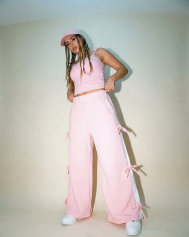 Pransh Artist’s Palette Collection, model in pink muse cinched top with bow details and premium materials